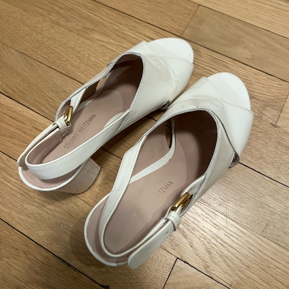 Beautiful Stuart Weitzman sandals in shiny white with big heel